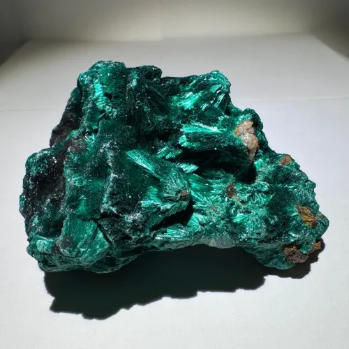 Close-up of malachite bands showing color gradient from light to dark green