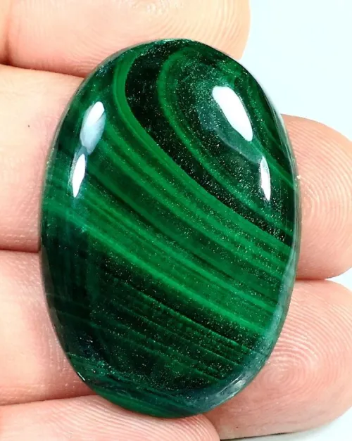 Close-up of malachite surface showing corrosion from salt exposure