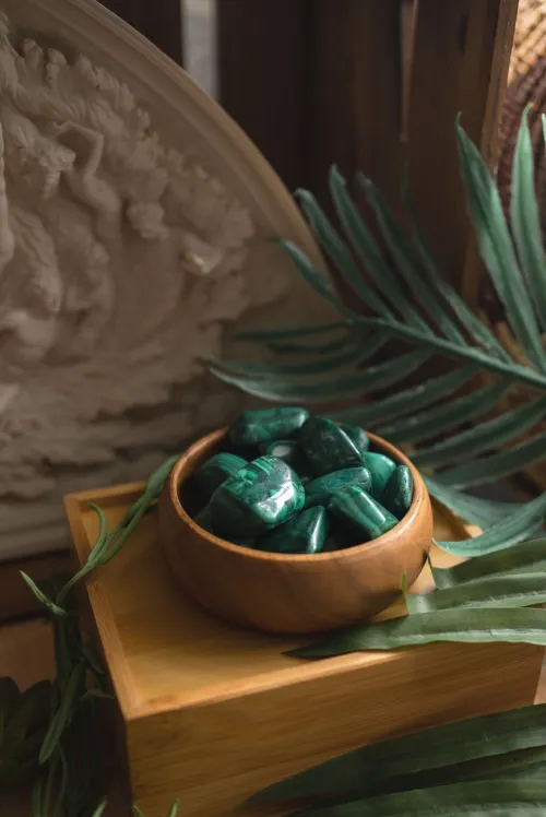 Contrast image: Left side showing pure Malachite's green bands, middle showing Azurite-Malachite matrix rock (distinct blue and green zones), right side showing pure blue Azurite crystals