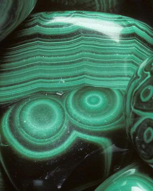 Malachite formation zones in copper mine cross-section