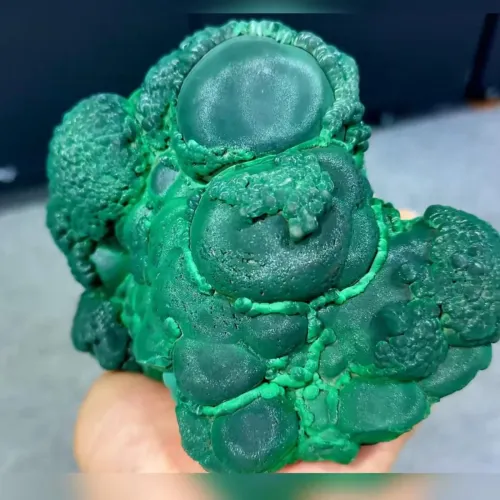 Can you put tumbled malachite wire wrap in patina solution